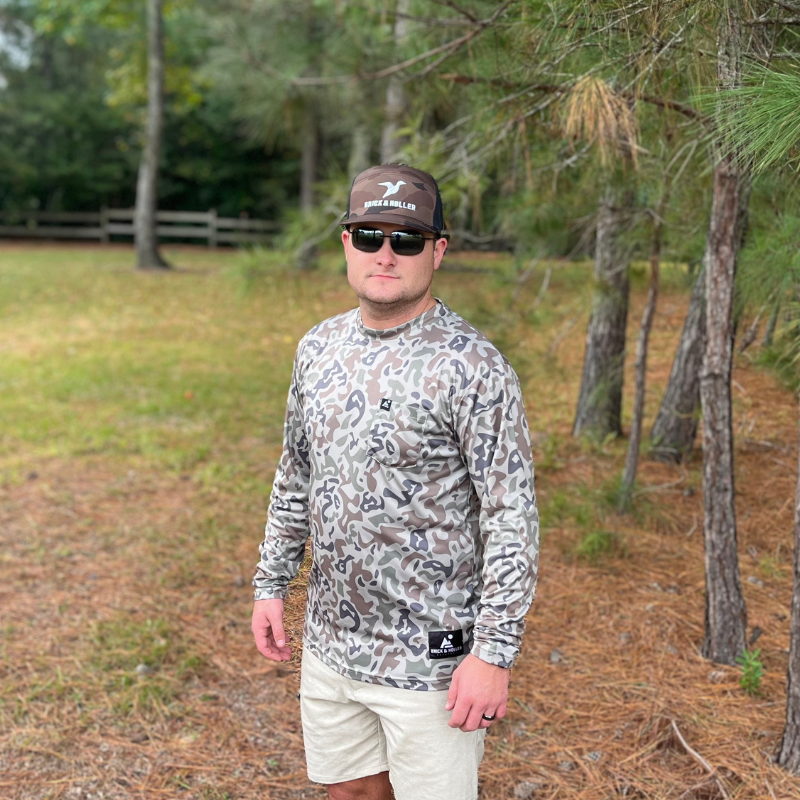 Brick & Holler Outdoors Duck Camo Hat.  A fantastic style Duck Camouflage Cambridge PB260 trucker-style hat. Finest in comfort and style. Take this camo hat hunting and look good in the woods.