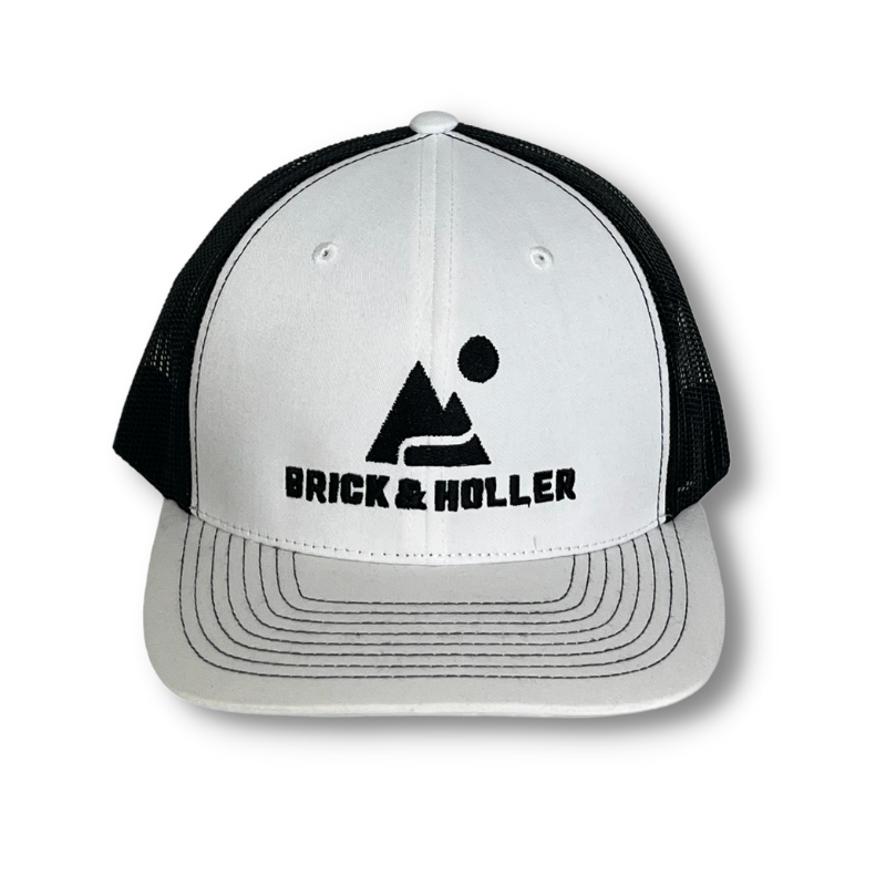 Brick & Holler Mountain Logo on White Trucker Hat with Black Mesh.