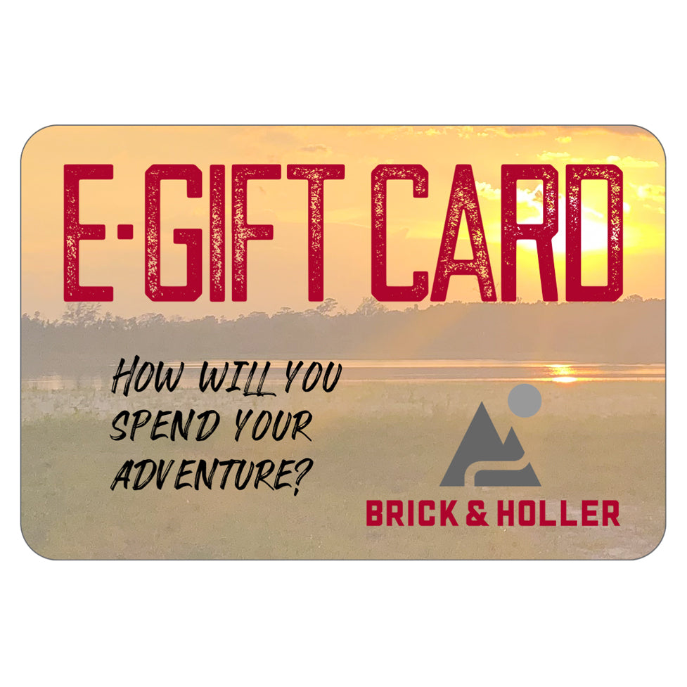 Brick & Holler gift card with sunset, Brick and Holler logo and "HOW WILL YOU SPEND YOUR ADVENTURE?"